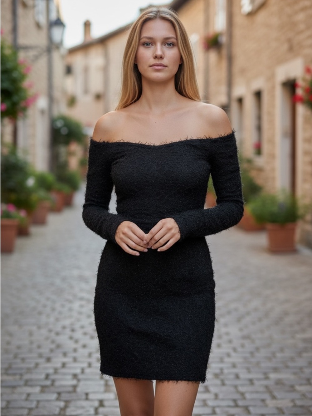 Black off-the-shoulder bodycon mini dress with a lace overlay. Size 9/10 youth